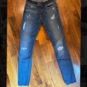 Hudson distressed skinny jeans.